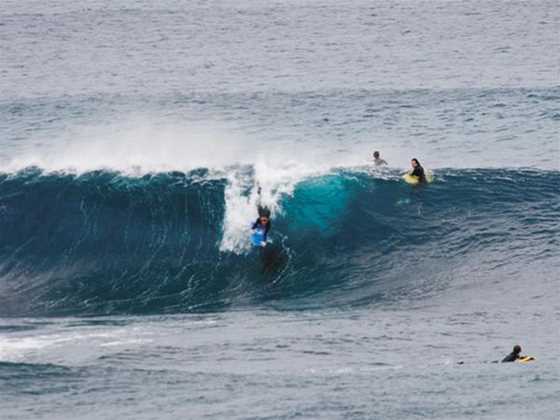 Surfing at Stark Bay